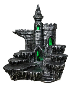 Expositor de castillo medieval de Stonewall con figura LED en las estepas rocosas-4