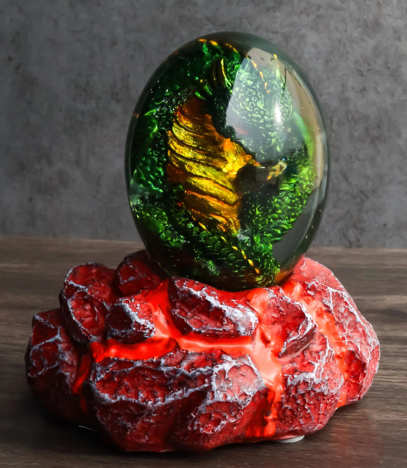 Huevo de dragón verde en vidrio acrílico con cristales de agua y bases de roca de lava LED.-1