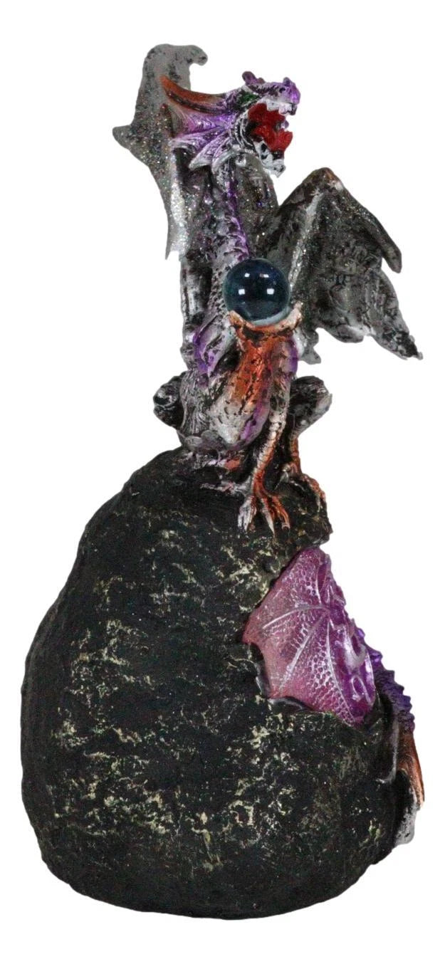 Dragón lavanda con luz LED en una montaña de lava de 8.5 pulgadas de alto. Fantasía.-5