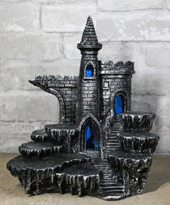 Expositor de castillo medieval de Stonewall con figura LED en las estepas rocosas-1