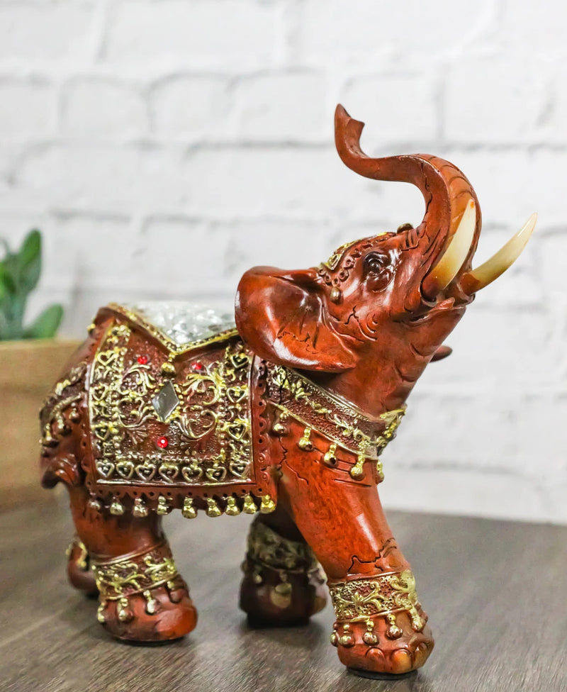 Faux Wood Trunk Up Elephant with Golden Scrollwork And Crushed Glass Figurine-1