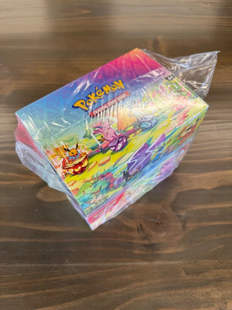 Expositor de latas pequeñas de Pokémon Prismatic Evolutions (8 latas pequeñas) Sellado de fábrica-1