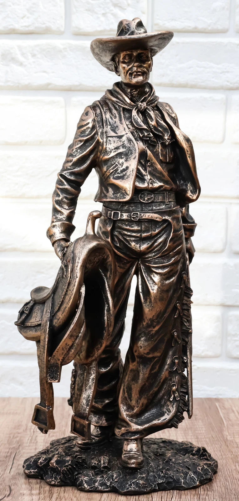 Old World Rustic Western Cowboy Holding Horse Saddle and Rifle Gun Statue 12"H