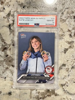 2024 Topps Now Olympics Katie Ledecky #29 Adds to Medals PSA 10-1