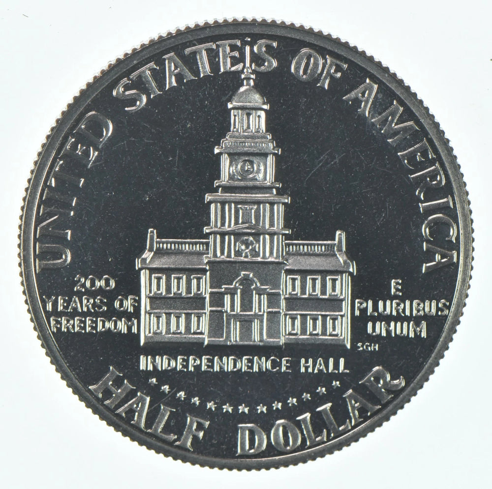 Moneda de medio dólar Kennedy de 1976-S, CLAD, a prueba