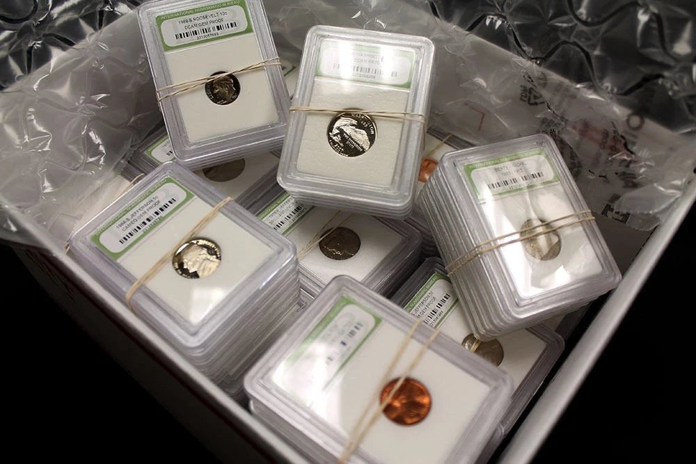 Enorme y alocada mezcla de más de 100 monedas de losa. Monedas BU, Proof y circuladas de EE. UU.-1