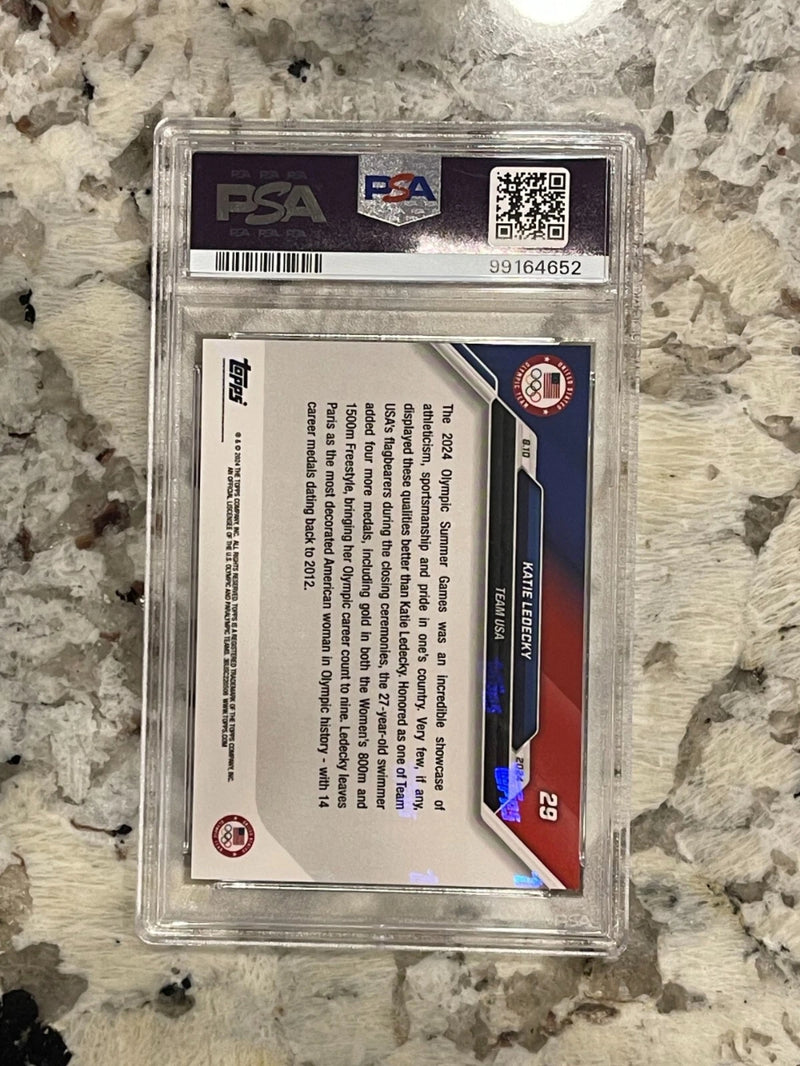 2024 Topps Now Olympics Katie Ledecky #29 Adds to Medals PSA 10-2